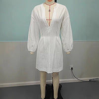 Deep V-neck Three-quarter-length Sleeves And A Fitted Waist Dress
